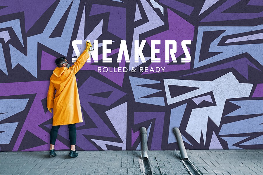 guy painting wall to include a the words sneakers rolled & ready with a purple background